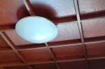 This image showcases a beautifully crafted ceiling, likely in a home or property.