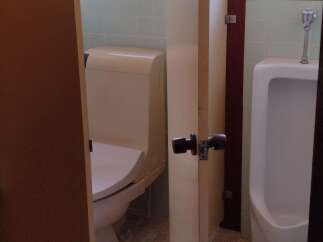 Step into a clean and well-maintained public restroom.