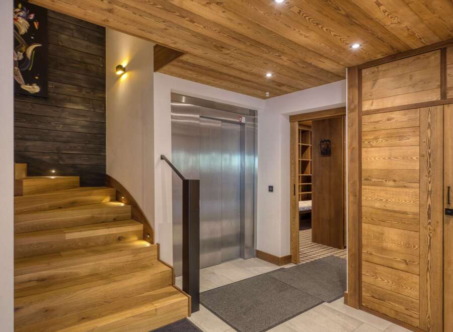 Step into luxury with this stunning property featuring exquisite wooden accents throughout.