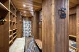Step into a world of rustic charm with this stunning ski locker room.