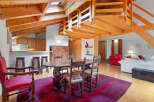 Discover the charm of this stunning property, featuring a unique architectural design with exposed wooden beams and a loft area.