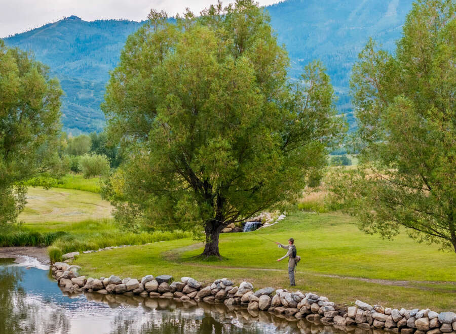 This stunning property boasts a serene waterfront setting, perfect for those seeking tranquility and natural beauty.