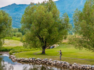 This stunning property boasts a serene waterfront setting, perfect for those seeking tranquility and natural beauty.