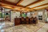 This stunning kitchen boasts a rustic yet elegant design, perfect for entertaining and everyday living.