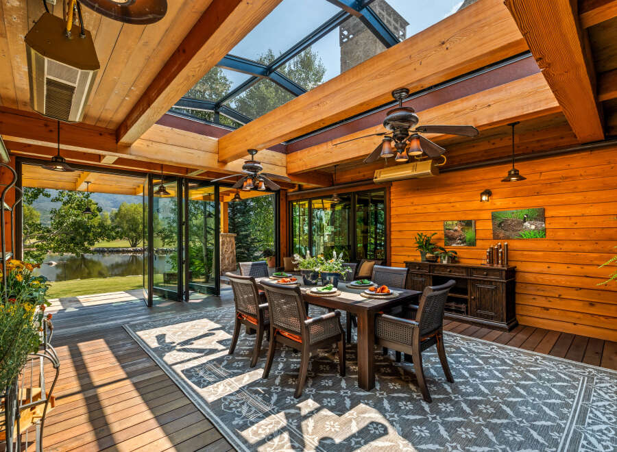 Experience luxury and tranquility in this stunning outdoor dining space.