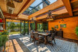 Experience luxury and tranquility in this stunning outdoor dining space.
