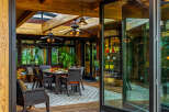 Step into luxury with this stunning outdoor dining area, perfect for entertaining or enjoying a quiet meal.