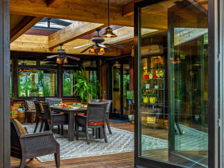 Step into luxury with this stunning outdoor dining area, perfect for entertaining or enjoying a quiet meal.