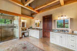 Step into luxury with this stunning bathroom, featuring a spacious walk-in shower and elegant vanity.