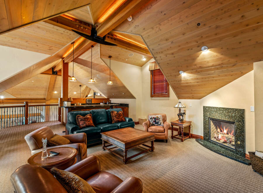 This stunning living room features a cozy fireplace, perfect for relaxing on chilly evenings.