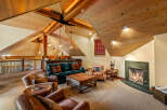 This stunning living room features a cozy fireplace, perfect for relaxing on chilly evenings.