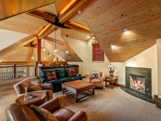 This stunning living room features a cozy fireplace, perfect for relaxing on chilly evenings.