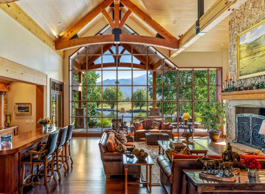 Experience luxury living in this stunning property, featuring a spacious living area with a breathtaking view.