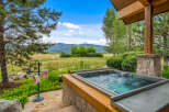 Experience luxury living with this stunning property featuring a private hot tub, perfect for relaxation.