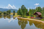 Escape to your dream retreat! This stunning property boasts a serene lake, perfect for waterside relaxation.