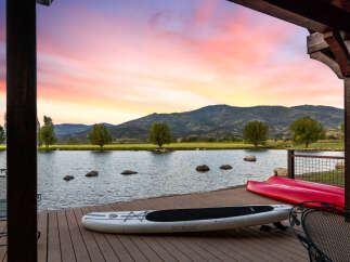 Experience the tranquility of lakeside living with this stunning property.