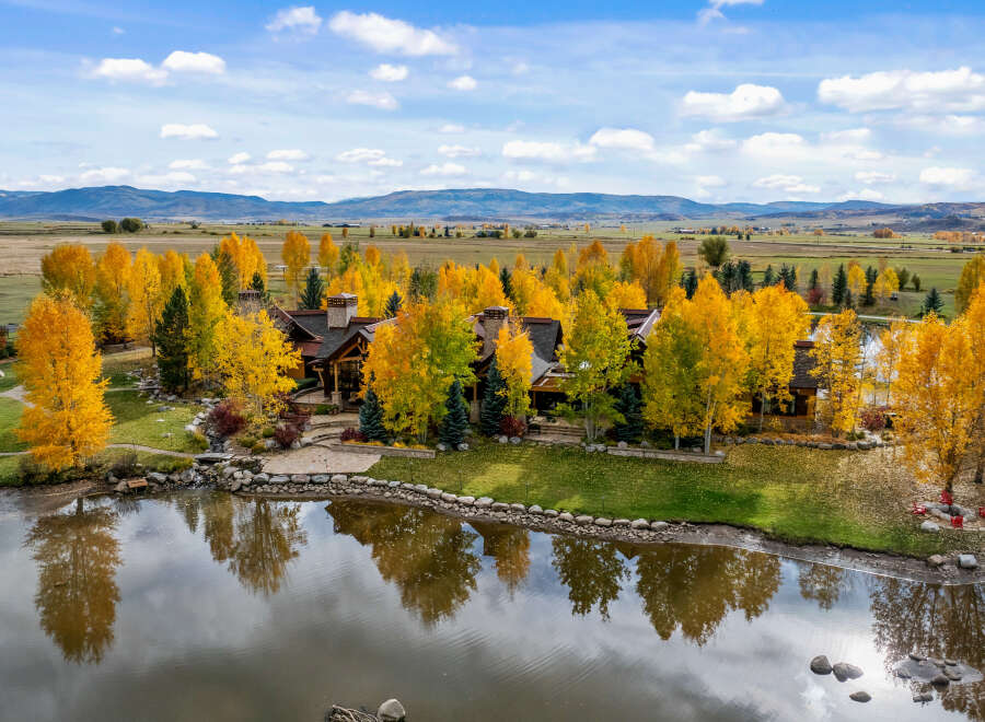 Discover a stunning luxury property nestled in a picturesque landscape.