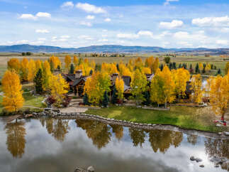 Discover a stunning luxury property nestled in a picturesque landscape.