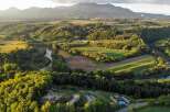 Discover the tranquility of this stunning property, nestled amidst lush greenery and rolling hills.