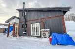 Discover this charming property nestled in a snowy landscape, perfect for a cozy retreat.