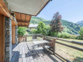 Enjoy breathtaking mountain views from this charming property's deck.