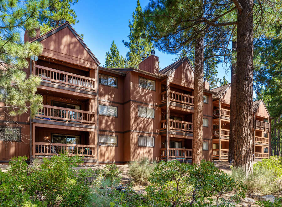Discover a charming condo nestled in a serene, wooded setting.