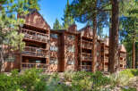 Discover a charming condo nestled in a serene, wooded setting.