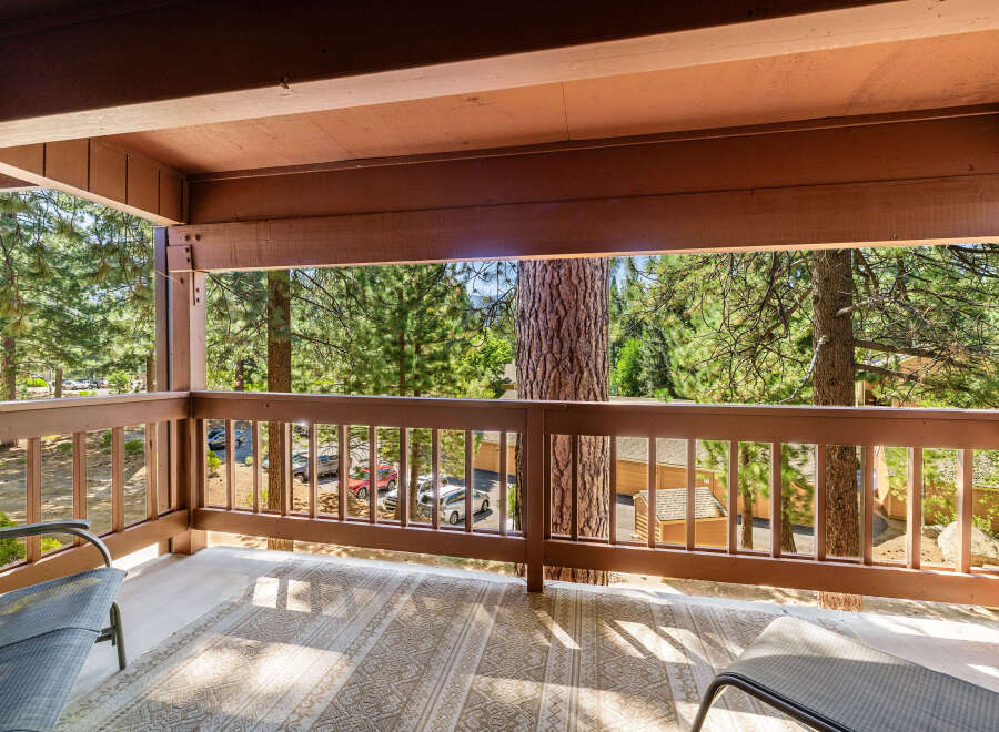 Enjoy the tranquility of nature from this stunning balcony.