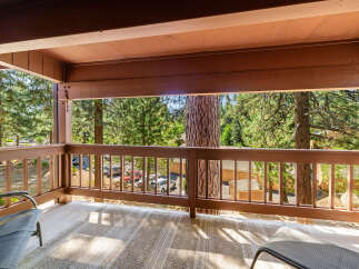 Enjoy the tranquility of nature from this stunning balcony.