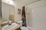 This charming bathroom features a clean and inviting design.