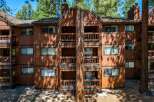 Discover the charm of this stunning multi-story property, featuring spacious balconies and a warm, inviting exterior.