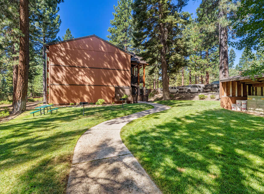 Discover the charm of this property, nestled in a serene, tree-lined setting.