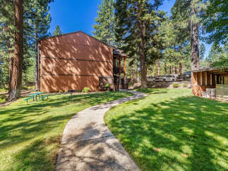 Discover the charm of this property, nestled in a serene, tree-lined setting.
