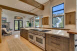 This stunning kitchen boasts a modern design with high-end appliances and ample counter space, perfect for culinary enthusiasts.
