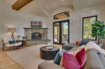 This stunning living room boasts a cozy fireplace, perfect for chilly evenings.