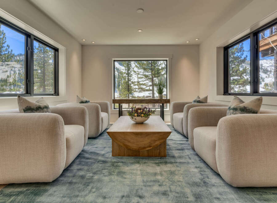 This stunning living room boasts a modern design with a touch of rustic charm.