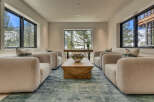 This stunning living room boasts a modern design with a touch of rustic charm.