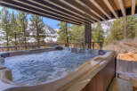 Enjoy the ultimate relaxation in this luxurious property featuring a hot tub with stunning mountain views.