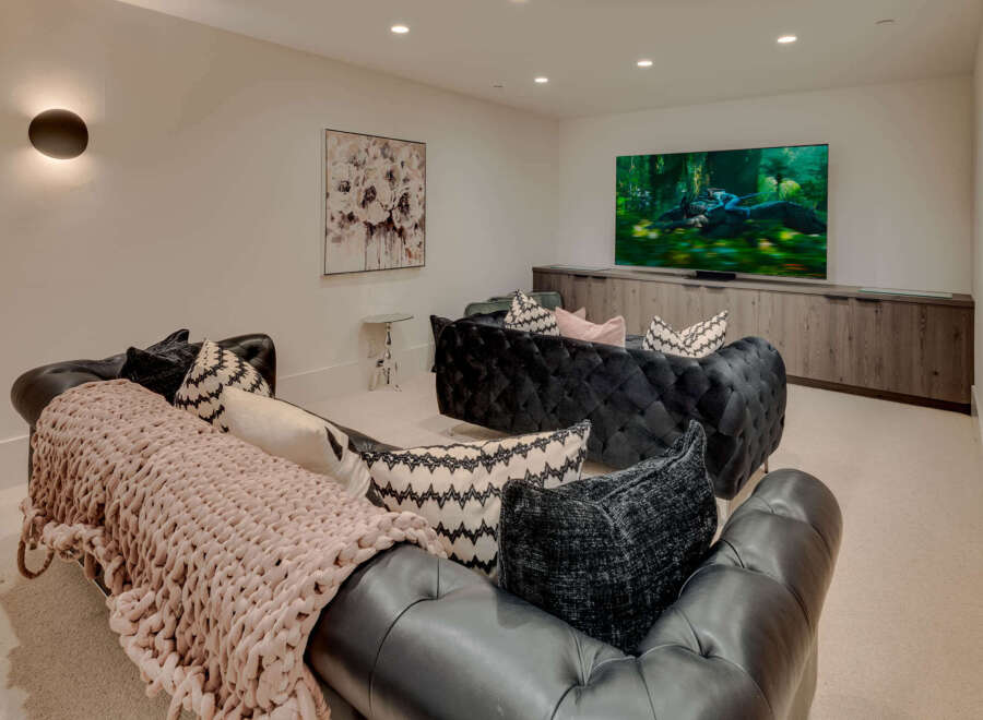 This luxurious living space features a modern design with a comfortable seating area.