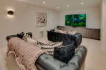 This luxurious living space features a modern design with a comfortable seating area.