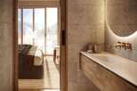 Experience luxury living with this stunning property, featuring a modern bathroom design.