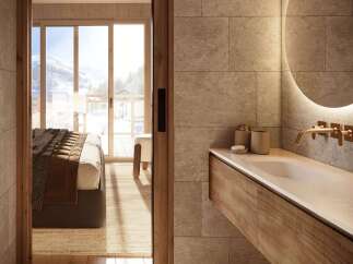 Experience luxury living with this stunning property, featuring a modern bathroom design.