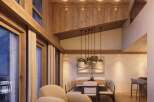 Experience luxury living in this stunning property, showcasing exquisite wooden architecture and a warm, inviting ambiance.