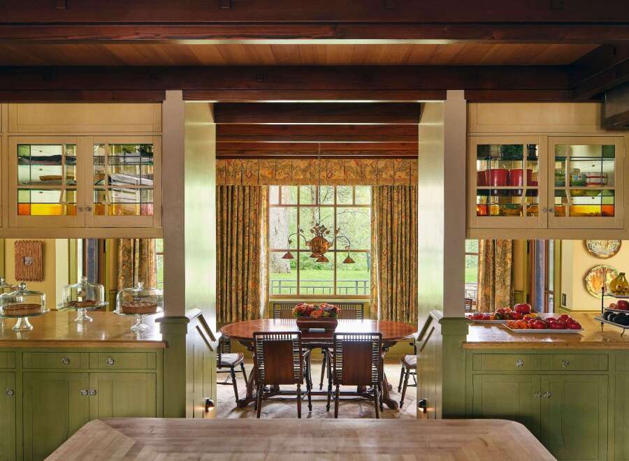 This stunning kitchen showcases a blend of classic and contemporary design, perfect for culinary enthusiasts.