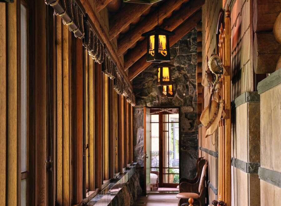 Step into rustic elegance with this stunning hallway, showcasing a harmonious blend of natural materials.