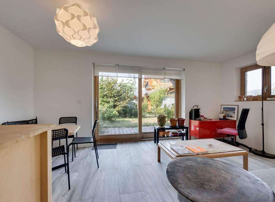 This bright and airy living space offers a seamless blend of indoor and outdoor living.