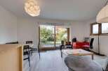 This bright and airy living space offers a seamless blend of indoor and outdoor living.