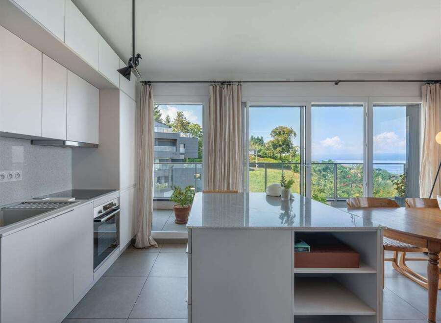 Experience luxury living in this stunning kitchen with breathtaking views.