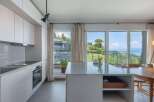Experience luxury living in this stunning kitchen with breathtaking views.
