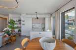 Experience modern living in this stunning property, featuring a bright and airy open-plan kitchen and dining area.